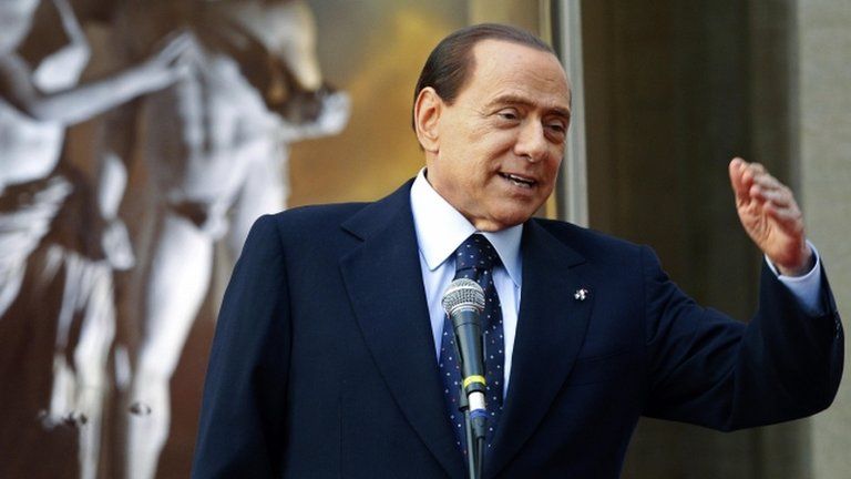 Then Italian Prime Minister Silvio Berlusconi speaks during the "Campus Mentis" award ceremony in Rome April 8, 2011