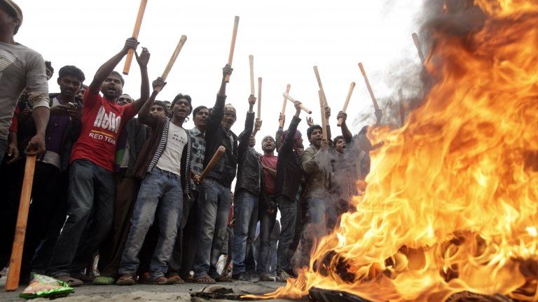 BNP activists set fire to tires in the capital of Bangladesh capital, Dhaka.