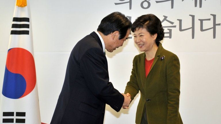 South Korea's President-elect Park Geun-Hye (R) shaking hands with Fukushiro Nukaga, a special envoy of Japanese Prime Minister Shinzo Abe, in Seoul, 4 January 2013