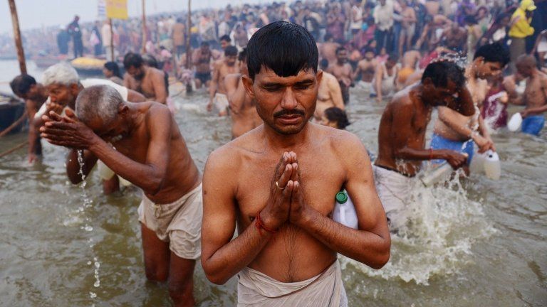 Pilgrims take to the waters in the Maha Kumbh Mela 14 January 2014