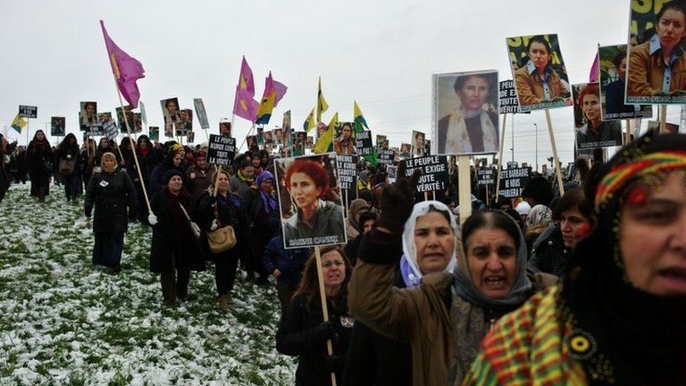 Mourners gather at Villiers le Bel, north of Paris, for a memorial ceremony for the three Kurdish women shot dead last week, 15 January