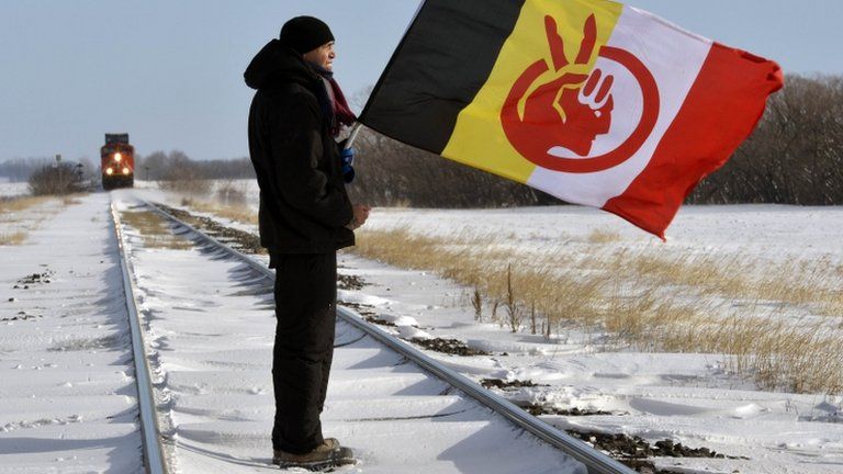Demonstrator Black Cloud blocks the Canadian National Railway line just west of Portage la Prairie, Manitoba 16 January 2013