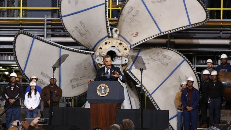 US President Barack Obama speaks at a shipyard in Newport News, Virginia 26 February 2013
