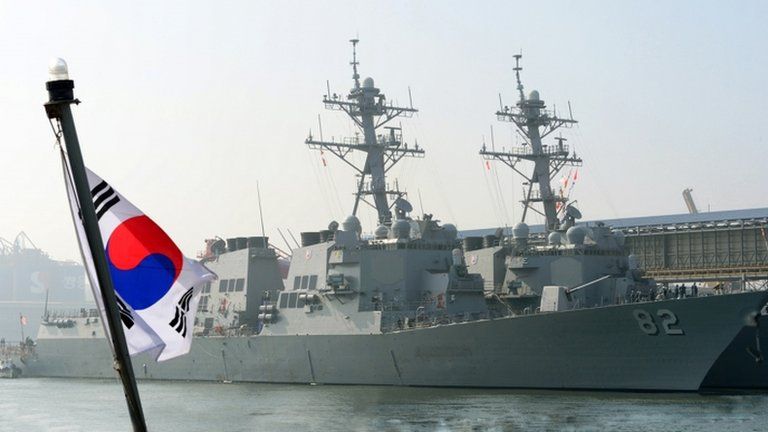 Guided-missile destroyers USS Lassen (L)and USS Fitzgerald arrive to participate in the annual joint military exercises between South Korea and the US at a naval port in Donghae, South Korea, on 9 March 2013