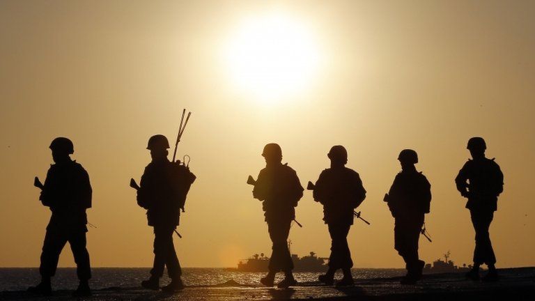 South Korean marines patrol on Yeonpyeong Island near the western maritime border between the two Koreas, 10 March 2013