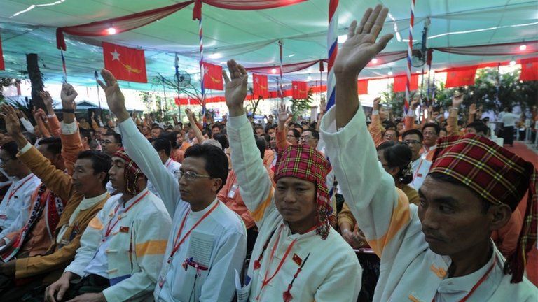 Delegates of National League for Democracy (NLD) vote during the first- ever party conference at the Royal Rose Hall in Rangoon, Burma on 9 March 2013