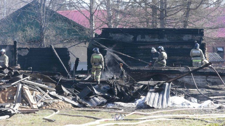 Emergency services work at the site of the hospital blaze in Ramenskiy, near Moscow, 26 April