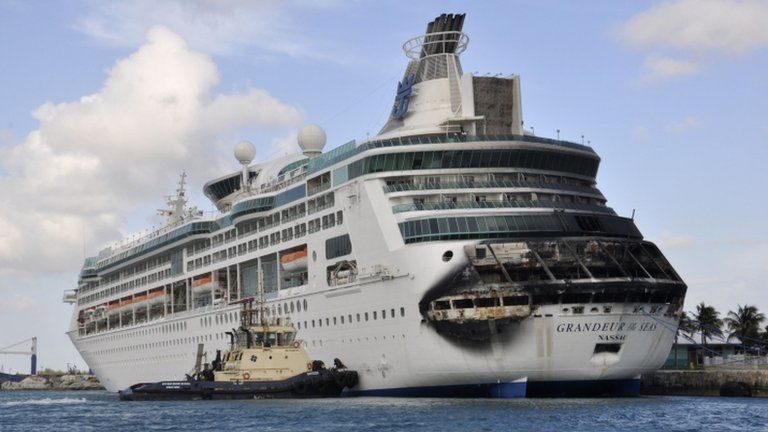 Damage on the Royal Caribbean ship Grandeur of the Seas is pictured as the ship is docked in Freeport, the Bahamas, on Monday