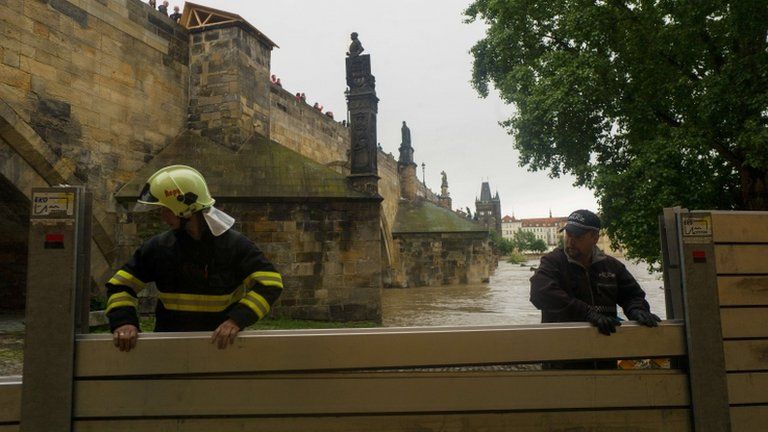 Anti-flood barriers are erected on the left bank of the River Vltava in Prague, 2 June