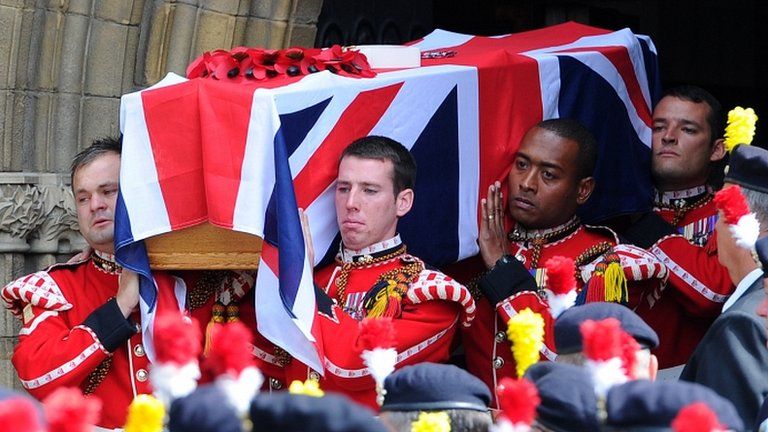 Lee Rigby's coffin carried by members of his regiment