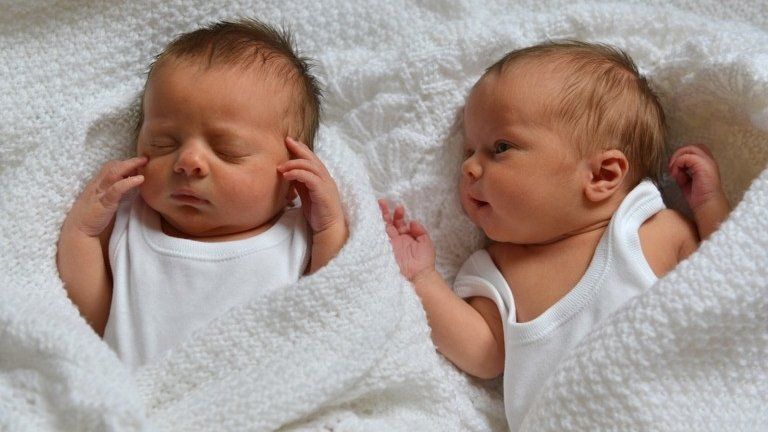 Five-day-old twin baby girls