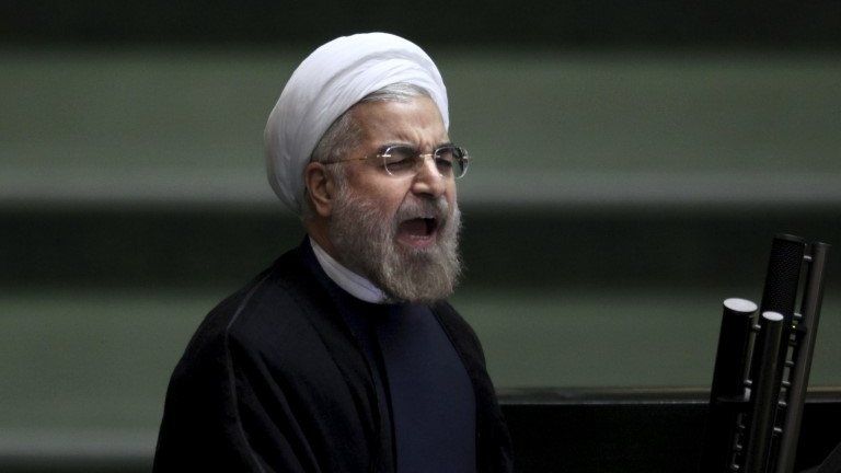 Iranian President Hassan Rouhani speaks in parliament, in Tehran, Iran, on 15 August 2013