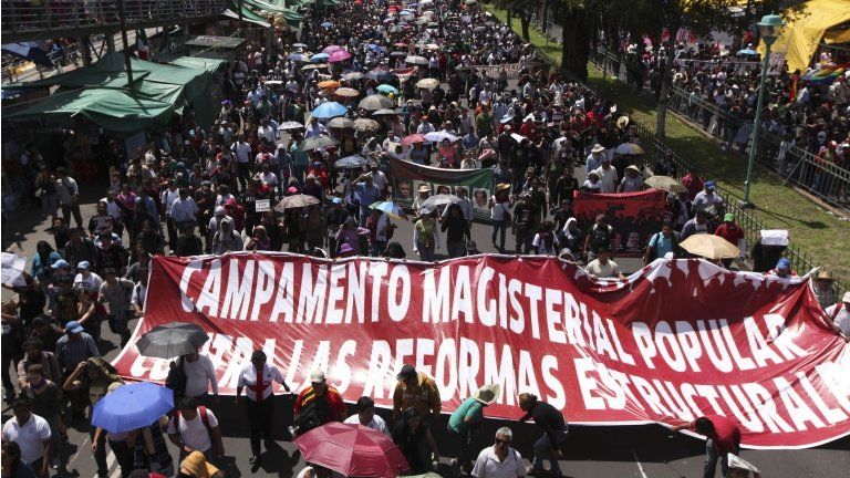 Protesters march on 1 September against an education reform bill in Mexico in the capital, Mexico City