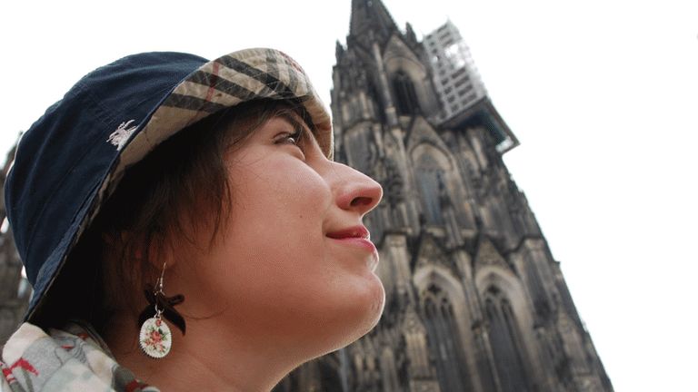 Helena Barcos beside Cologne's cathedral