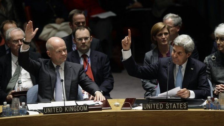 Left to right: British Foreign Secretary William Hague and US Secretary of State John Kerry vote on a Syria resolution