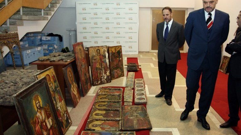 Albanian Prime Minister Edi Rama inspects stolen art in Tirana, 9 October 2013