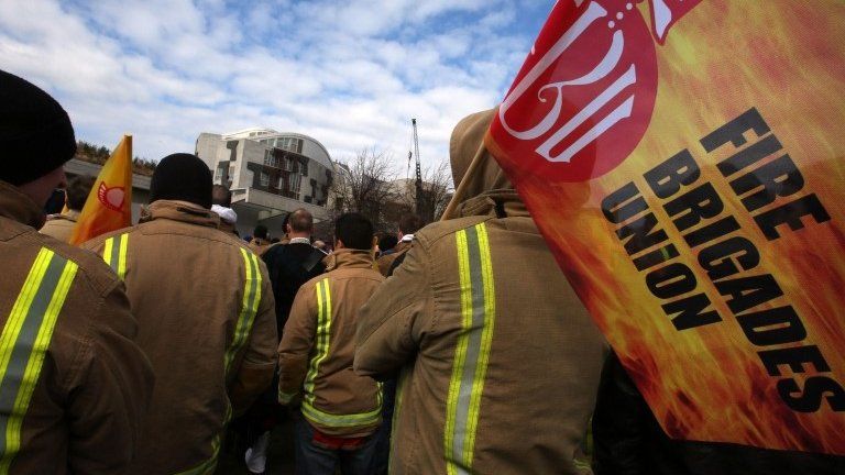 Firefighters attending a union rally