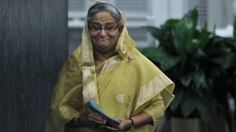 Bangladesh"s PM Sheikh Hasina leaves the podium after addressing the United Nations General Assembly at the U.N. headquarters in New York