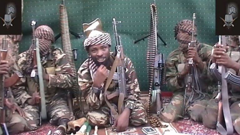 Photo showing a man claiming to be Boko Haram's leader Boko Haram Abubakar Shekau (centre)