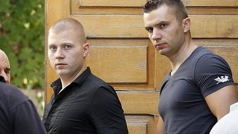 Eugen Darie, (left) and Radu Dogaru leave court Aug 2013