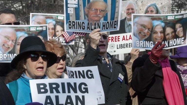 Supporters rally on behalf of imprisioned US citizen Alan Gross, calling for US President Barack Obama to help free Gross, who has been in a Cuban prison for 4 years, during a rally in Lafayette Park 3 December 2013