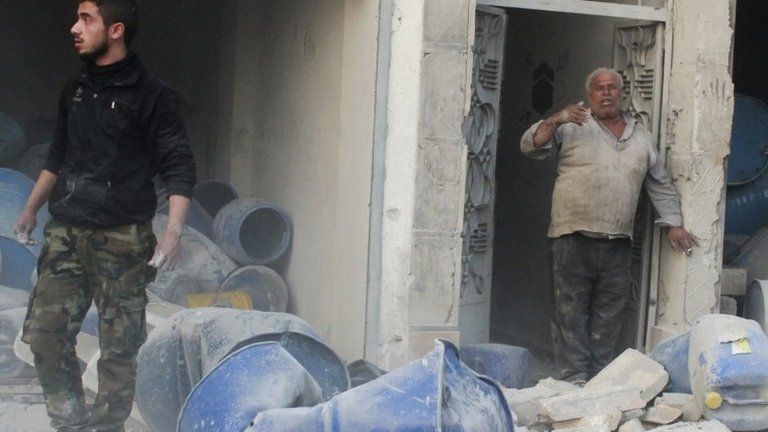 A site reportedly hit by barrel bombs dropped by Syrian government forces in Aleppo, 28 November 2013.