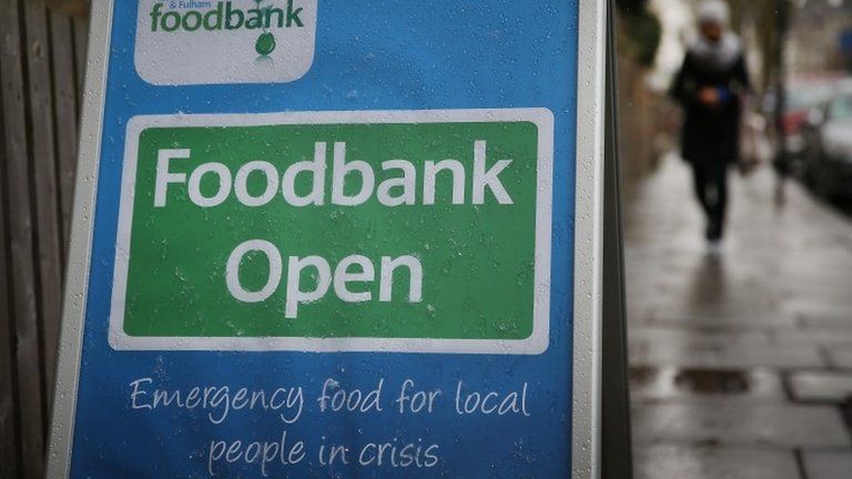 A sign sits outside the Hammersmith and Fulham Foodbank charity at St Simons church on April 4 2013