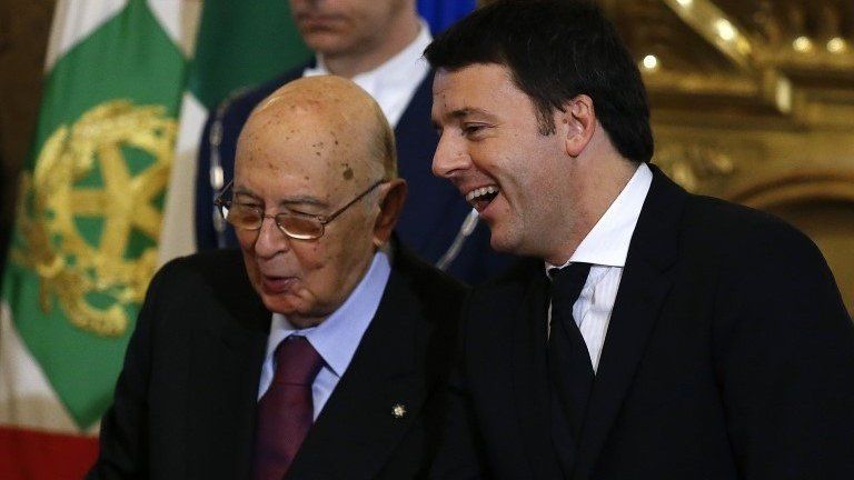 Newly appointed Italian Prime Minister Matteo Renzi (R) talks with Italian President Giorgio Napolitano during the swearing in ceremony for 16 new ministers at Quirinale palace in Rome February 22, 2014