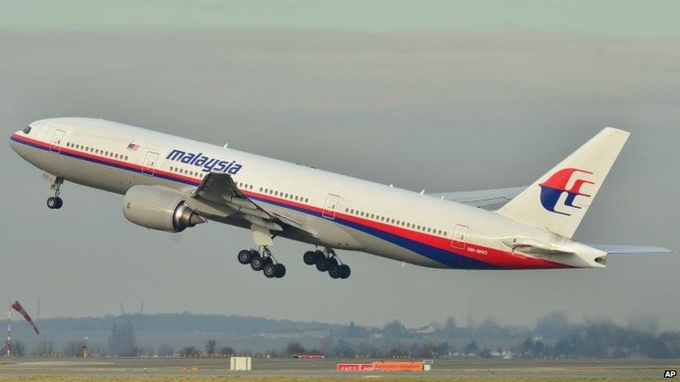 This photo provided by Laurent Errera and taken 26 December shows the Malaysia Airlines Boeing 777-200ER that disappeared from air traffic control screens on Saturday