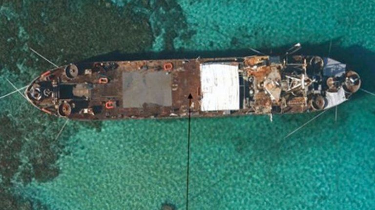 Undated handout photo released by the Philippine Government in 2013 shows an aerial view of BRP Sierra Madre grounded at Second Thomas Shoal in the Spratly islands