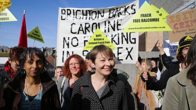Caroline Lucas with supporters outside Brighton Magistrates' Court