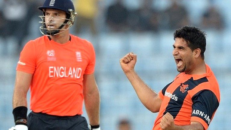 Mudassar Bukhari celebrates the wicket of England batsman Michael Lumb