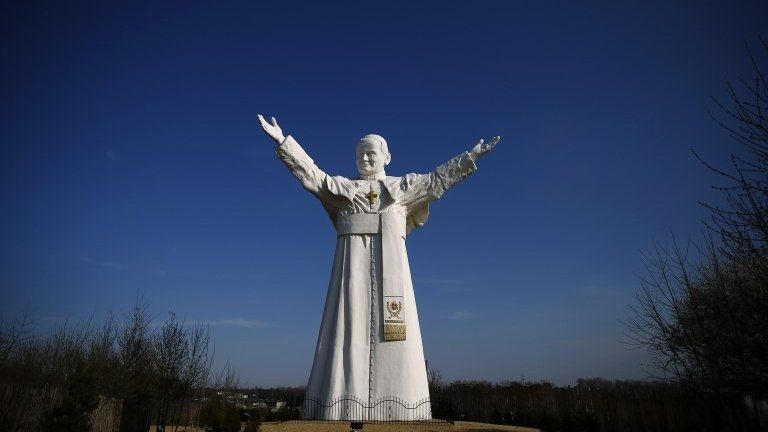 File photo: A monument of the late Pope John Paul II stands in Czestochowa, southern Poland, 2 April 2014