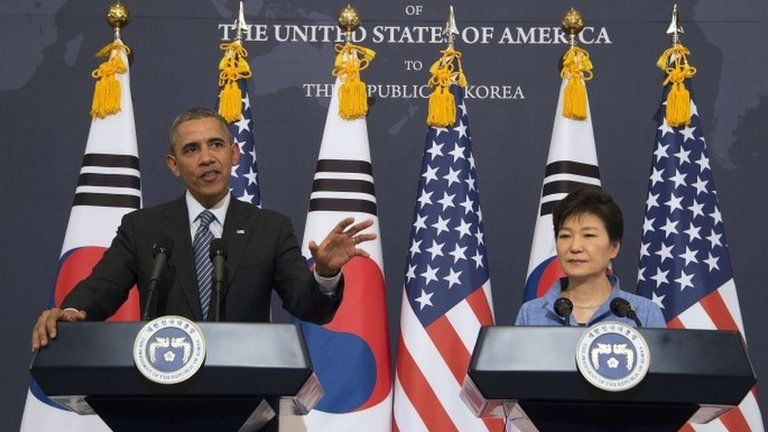 US President Barack Obama (L) and South Korean President Geun-hye Park (R) speak during a join press conference at the Blue House in Seoul on 25 April 2014