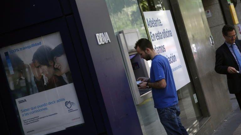 Man using cash machine in Madrid