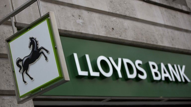 A sign outside a branch of Lloyds Bank in the City London