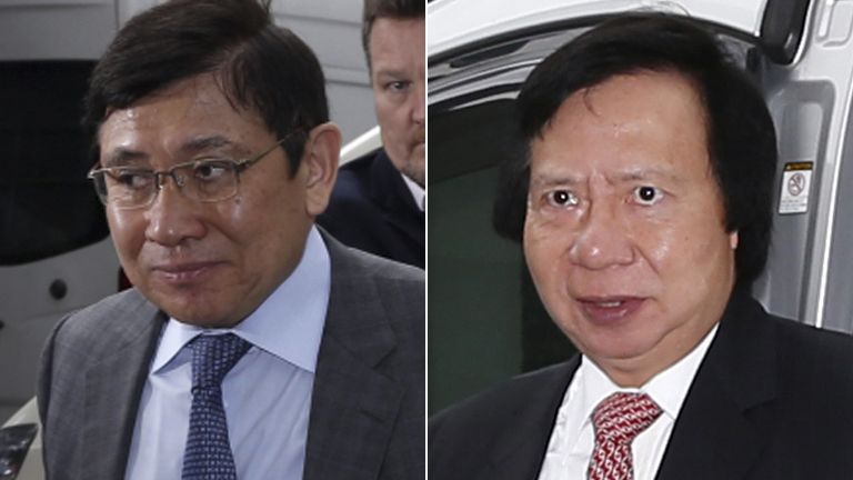 Raymond Kwok (L) and Thomas Kwok arrive at court in Hong Kong. 8 May 2014