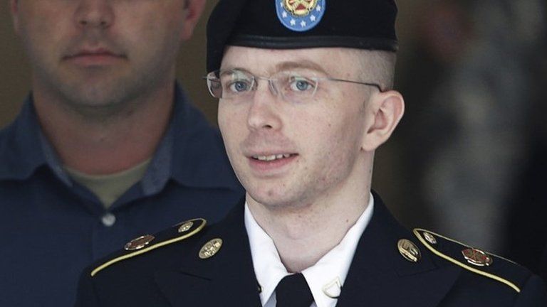 US Army Private First Class Chelsea Manning (C) departs the courthouse at Fort Meade, Maryland 30 July 2013