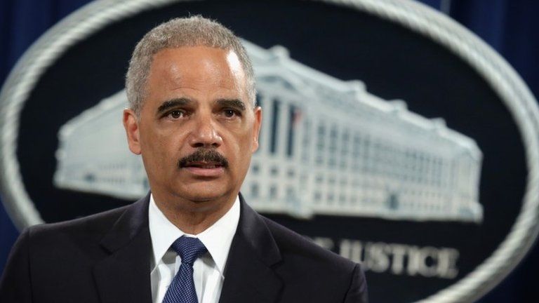 US Attorney General Eric Holder speaks as he announces indictments against Chinese military hackers on cyber-espionage 19 May 2014