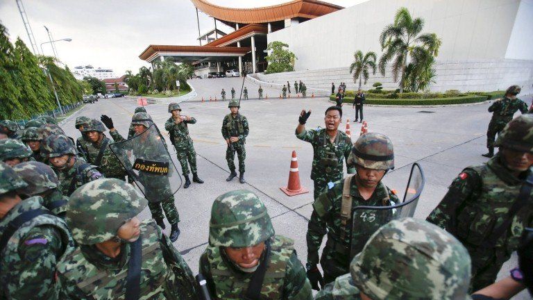 MAY 22, 2014 AP03 Thai soldiers take control during a coup at the Army Club where Thailand"s army chief held a meeting with all rival factions in central Bangkok
