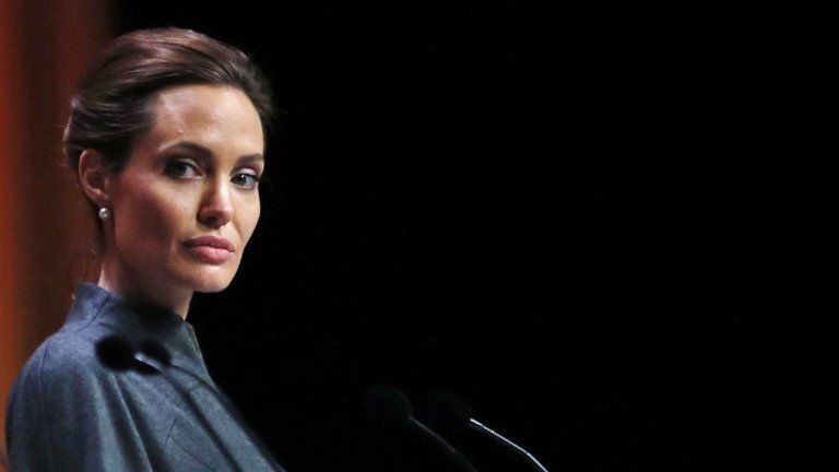 Angelina Jolie speaks at the end of the global summit on sexual violence in conflict in London on 13 June 2014