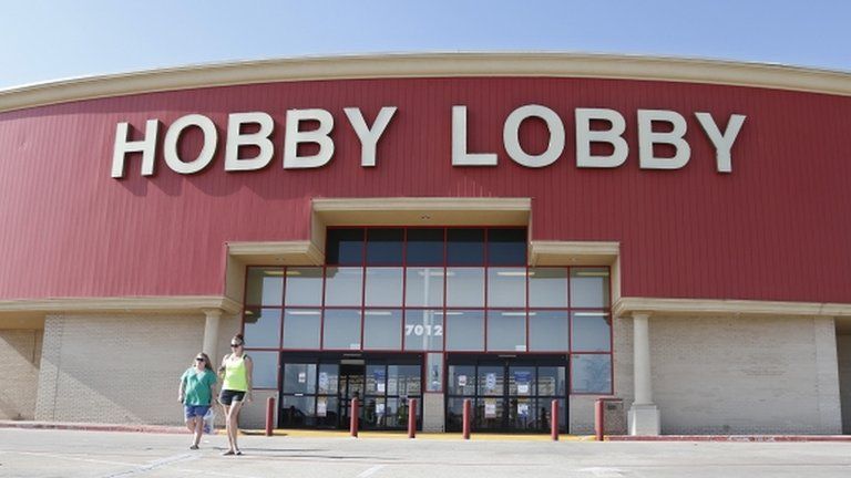 Customers leave a Hobby Lobby store in Oklahoma City, Oklahoma, on 30 June 2014