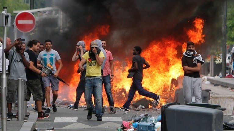 Rioters face police in Sarcelles, north of Paris, 20 July