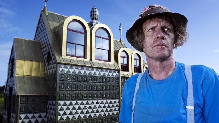 Grayson Perry in front of the chapel in Wrabness