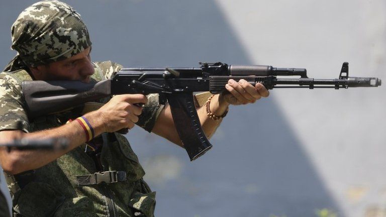 Spanish volunteer Rafa Munoz Perez practising with a rifle in Donetsk, 7 August