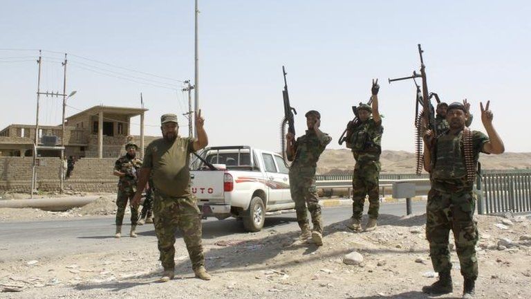 Iraqi forces celebrate entering Amerli, 31 Aug