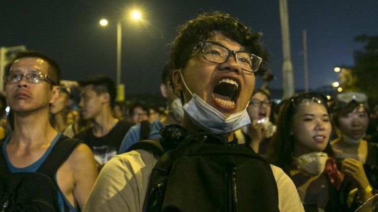 A protester stands outside the legislative government complex as the standoff continues on October 2, 2014 in Hong Kong