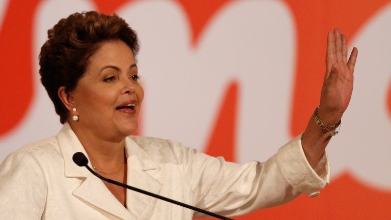 Brazilian President and Workers' Party (PT) presidential candidate Dilma Rousseff speaks during a news conference after voting in the first round of election in Brasilia