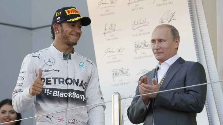 Lewis Hamilton celebrates winning the Russian GP, appluaded by Russian President Vladimir Putin