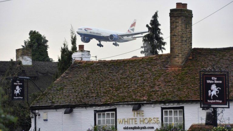 Aircraft over Longford village next to Heathrow Airport